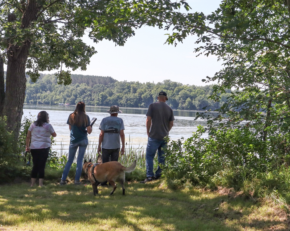 Shoreline site visit with landowners and two soil and water conservation district staff.